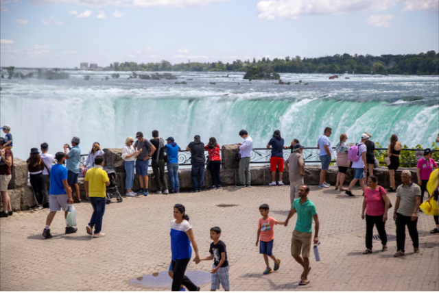 tourist take photos in front of niagara falls in niagara falls ontario canada june 28 2022 reuters carlos osorio file photo tourist take photos in front of niagara falls in niagara falls ontario canada june 28 2022 reuters carlos osorio file photo