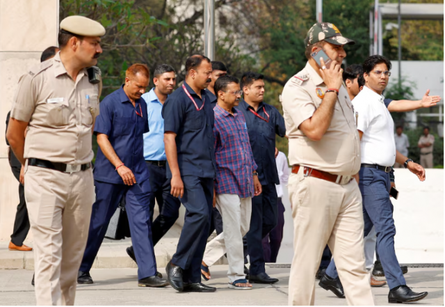 police officers escort chief minister of delhi and aam aadmi party aap arvind kejriwal as he leaves the court after a hearing in new delhi india march 28 2024 reuters sharafat ali file photo police officers escort chief minister of delhi and aam aadmi party aap arvind kejriwal as he leaves the court after a hearing in new delhi india march 28 2024 reuters sharafat ali file photo