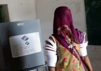 a woman leaves after casting her vote at a polling station during the second phase of the general elections in barmer rajasthan india april 26 2024 reuters adnan abidi