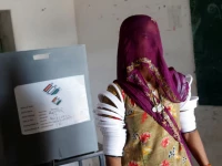 a woman leaves after casting her vote at a polling station during the second phase of the general elections in barmer rajasthan india april 26 2024 reuters adnan abidi a woman leaves after casting her vote at a polling station during the second phase of the general elections in barmer rajasthan india april 26 2024 reuters adnan abidi