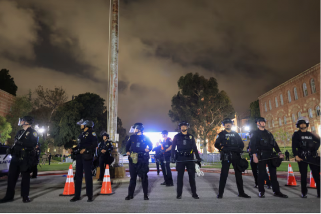 chp officers stand guard near an area showing messages of support for israeli hostages in gaza amid clashes at a nearby pro palestinian encampment on the university of california los angeles ucla campus in los angeles california u s may 1 2024 reuters david swanson chp officers stand guard near an area showing messages of support for israeli hostages in gaza amid clashes at a nearby pro palestinian encampment on the university of california los angeles ucla campus in los angeles california u s may 1 2024 reuters david swanson