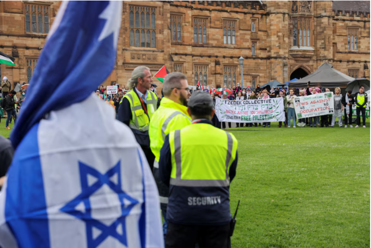 protesters in support of israel and palestinians in gaza face off during a demonstration at the university of sydney amid the ongoing conflict between israel and the palestinian islamist group hamas in sydney australia may 3 2024 reuters lewis jackson