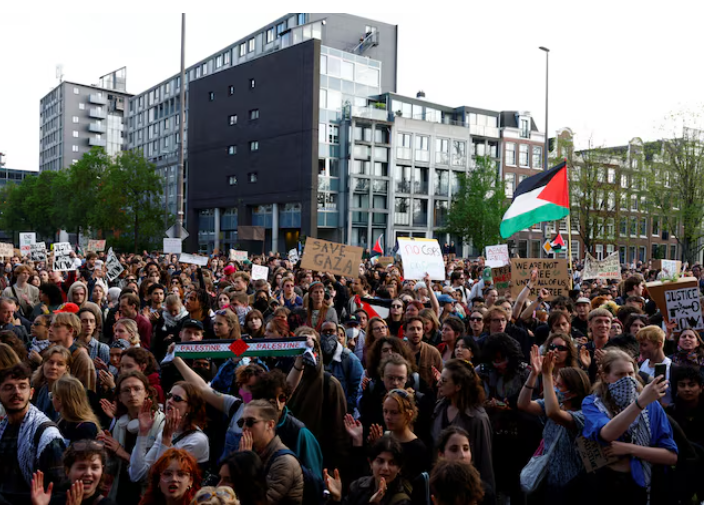 students and employees of the university of amsterdam take part in a march against the ongoing israel s war on gaza the university leadership after police broke up a student protest camp overnight in amsterdam netherlands may 7 2024 reuters piroschka van de wouw