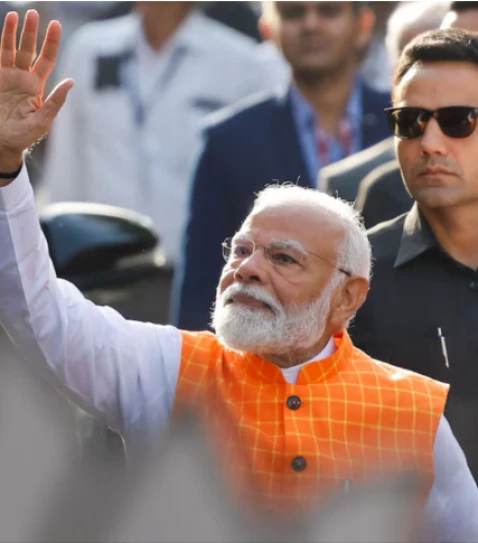 india s prime minister narendra modi waves on the day he votes during the third phase of the general election in ahmedabad india may 7 2024 reuters adnan abidi file phot