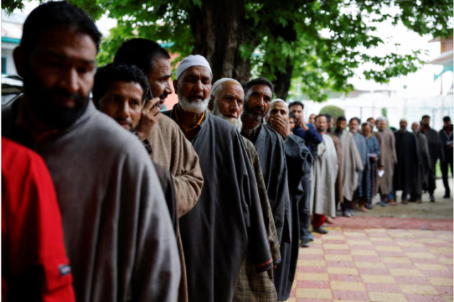 people stand in a queue to vote at a polling station during the fourth general election phase in south kashmir s pulwama district may 13 2024 reuters sharafat al people stand in a queue to vote at a polling station during the fourth general election phase in south kashmir s pulwama district may 13 2024 reuters sharafat al