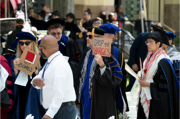 faculty and administrators protest the conflict between israel and the palestinian islamist group hamas during the commencement at yale university new haven connecticut u s may 20 2024 reuters michelle mcloughlin