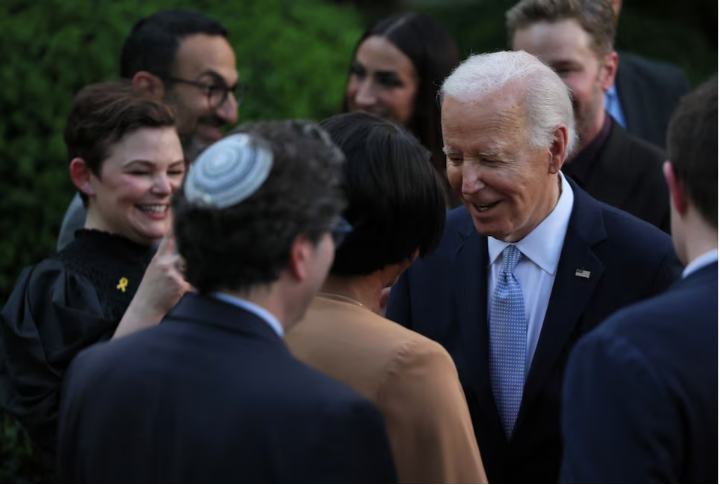 u s president joe biden mingles with the crowd including tiffany haddish and ginnifer goodwin after giving a speech while hosting a celebration for jewish american heritage month in the rose garden at the white house in washington us may 20 2024 reuters leah millis