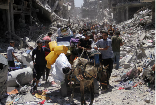 palestinians make their way as they inspect the damage after israeli forces withdrew from jabalia refugee camp following a raid in the northern gaza strip may 31 2024 reuters mahmoud issa palestinians make their way as they inspect the damage after israeli forces withdrew from jabalia refugee camp following a raid in the northern gaza strip may 31 2024 reuters mahmoud issa