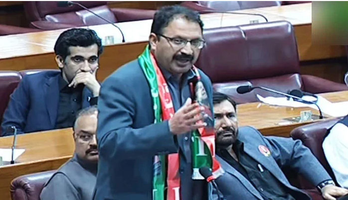 pakistan tehreek e insaf pti lawmaker junaid akbar addresses the national assembly in this still taken from a video on march 1 2024 youtube ptv parliament