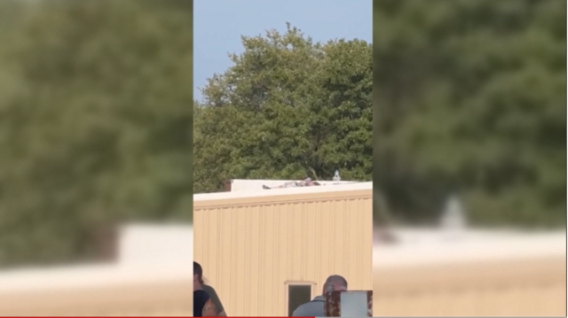 watch video shows gunman shot on roof of nearby building in trump rally watch video shows gunman shot on roof of nearby building in trump rally