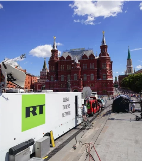 russian state broadcaster rt broadcasting from near red square during the 2018 world cup in moscow the justice department alleges an rt employee was behind an ai powered effort to create fake social media profiles of americans to spread russian propaganda in the u s christopher furlong getty images