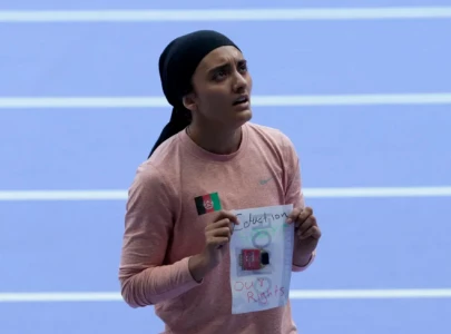 sprinter kimia yousofi uses olympics platform to highlight women s issues in afghanistan