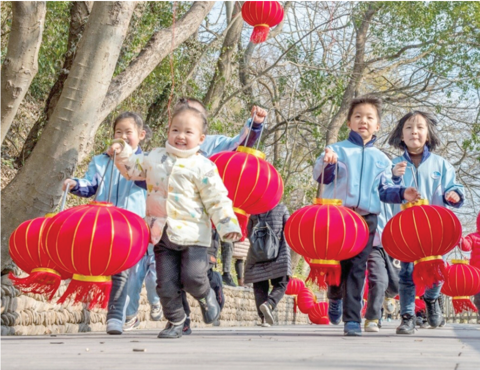 children are seen carrying red lanterns an important and traditional decorative item for the chinese new year photo express