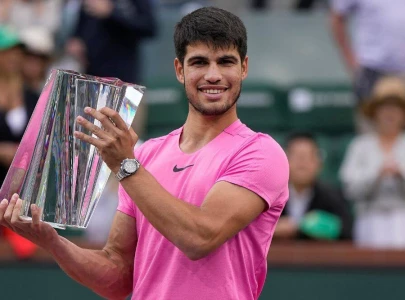 alcaraz routs medvedev for indian wells title