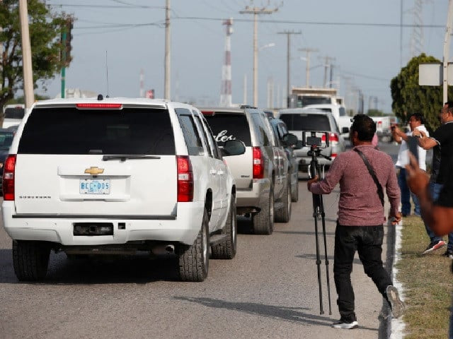 vehicles pass by as they carry the bodies of americans kidnapped by gunmen to the us border in matamoros mexico march 9 2023 photo reuters vehicles pass by as they carry the bodies of americans kidnapped by gunmen to the us border in matamoros mexico march 9 2023 photo reuters