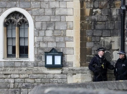 uk police probe video after intruder held at queen s castle