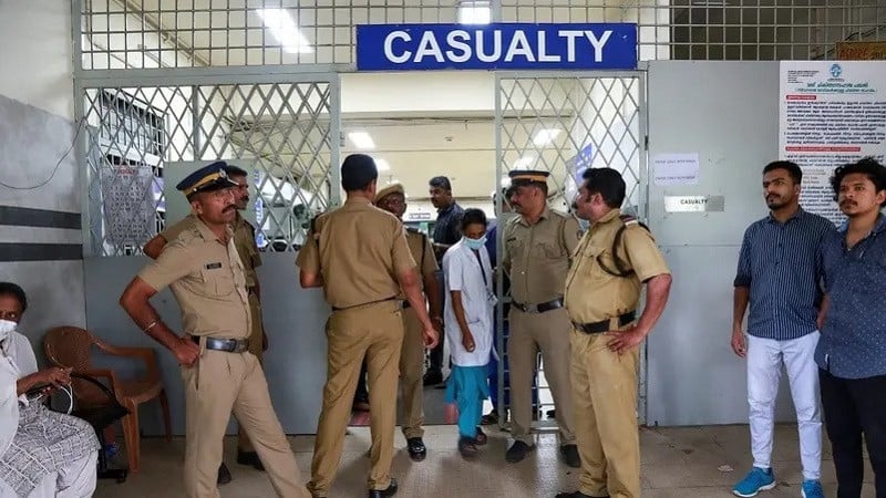 policemen stand guard at the entrance of the casualty ward of a hospital in india photo reuters