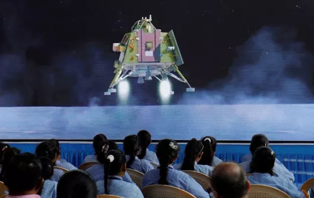 people watch a live stream of chandrayaan 3 spacecraft s landing on the moon inside an auditorium of gujarat science city in ahmedabad india photo reuters people watch a live stream of chandrayaan 3 spacecraft s landing on the moon inside an auditorium of gujarat science city in ahmedabad india photo reuters