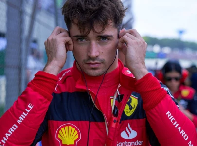 ferrari s leclerc claims fourth straight pole in baku