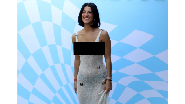 charli smiling while posing in a white knit dress with butterflies at coachella photo chad salvador shutterstock charli smiling while posing in a white knit dress with butterflies at coachella photo chad salvador shutterstock