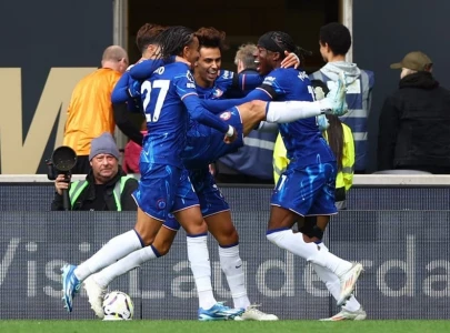 chelsea secure first league points with madueke s hat trick against wolves