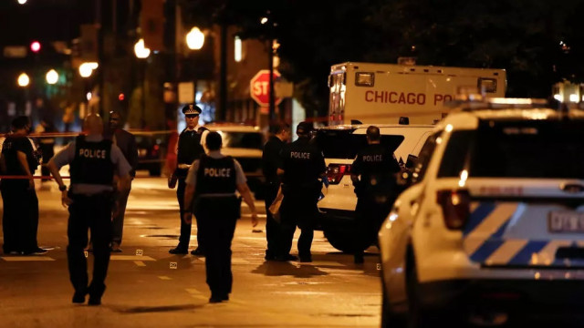fourteen people were wounded in the shootout outside a funeral parlor in chicago photo afp fourteen people were wounded in the shootout outside a funeral parlor in chicago photo afp
