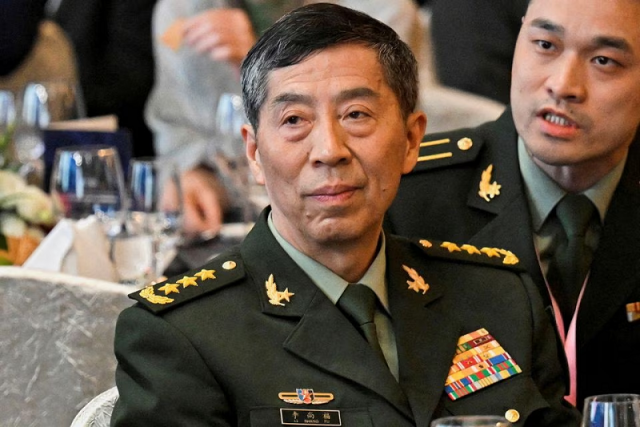 china ousts defence minister the second senior leader to leave in three months china ousts defence minister the second senior leader to leave in three months