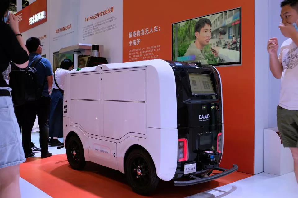 an autonomous delivery vehicle by damo is displayed at the world artificial intelligence conference waic in shanghai china july 8 2021 photo reuters an autonomous delivery vehicle by damo is displayed at the world artificial intelligence conference waic in shanghai china july 8 2021 photo reuters