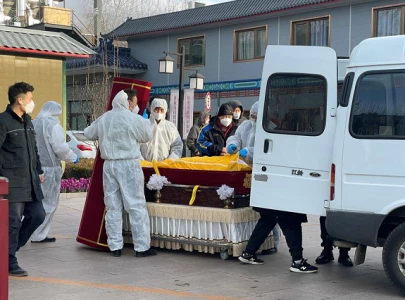 in covid hit beijing funeral homes and crematoriums are busy