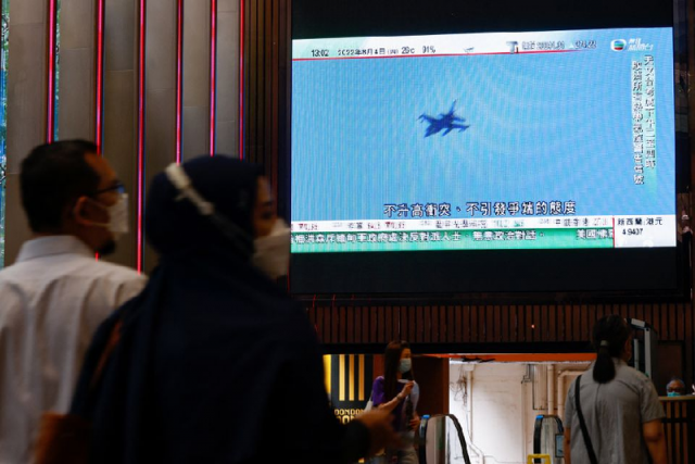 a tv screen shows that china s people s liberation army has begun military exercises including live firing on the waters and in the airspace surrounding the island of taiwan as reported by chinese state television in hong kong china august 4 2022 photo reuters a tv screen shows that china s people s liberation army has begun military exercises including live firing on the waters and in the airspace surrounding the island of taiwan as reported by chinese state television in hong kong china august 4 2022 photo reuters