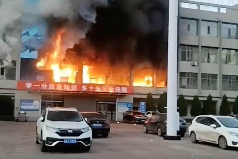 fire burns at the yongju coal industry joint building in luliang city shanxi province china photo reuters