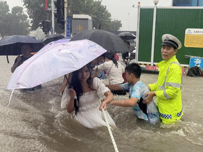 at least 25 dead as china province deluged by heaviest rains in 1 000 years