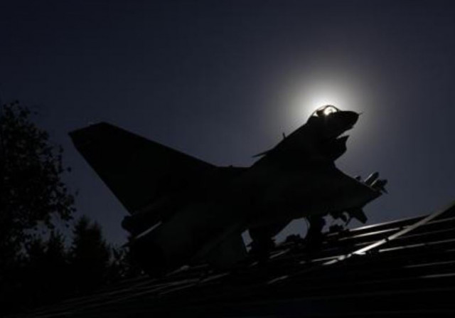 a replica of a chinese jian 10 fighter jet is seen outside the aviation industry corporation of china avic headquarters building in beijing october 30 2012 photo reuters file