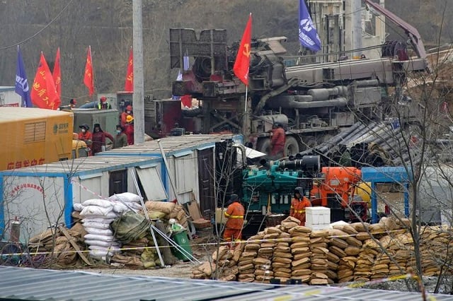 rescuers work at the hushan gold mine where workers were trapped underground after the jauary 10 explosion in qixia shandong province china january 22 2021 photo reuters