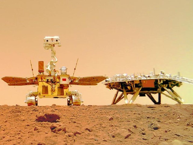 photo released on june 11 2021 by the china national space administration cnsa shows a selfie of china s first mars rover zhurong with the landing platform photo xinhua