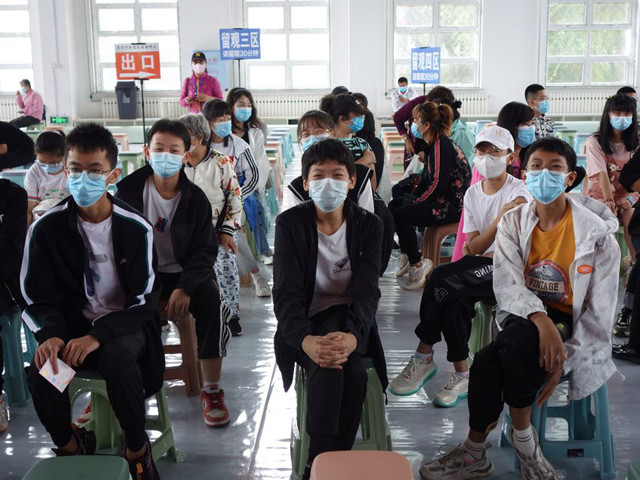 residents wait at the observation area during a coronavirus disease vaccination session for those aged between 12 and 14 in heihe heilongjiang province china august 3 2021 photo china daily via reuters