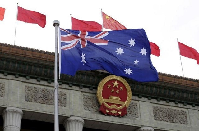 australian flag flutters in front of the great hall of the people during a welcoming ceremony for australian prime minister malcolm turnbull not in picture in beijing china april 14 2016 photo reuters