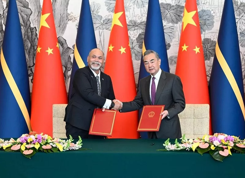 chinese foreign minister wang yi holds talks with nauru s minister for foreign affairs and trade lionel aingimea in beijing china jan 24 2024 photo xinhua chinese foreign minister wang yi holds talks with nauru s minister for foreign affairs and trade lionel aingimea in beijing china jan 24 2024 photo xinhua