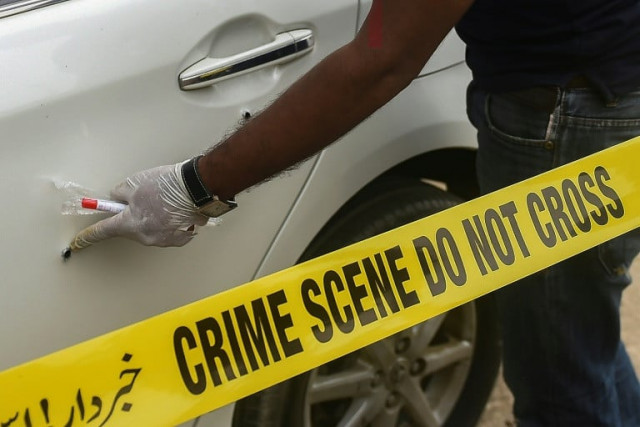 local police said two masked assailants riding on a motorbike fired at a car carrying two chinese nationals photo afp local police said two masked assailants riding on a motorbike fired at a car carrying two chinese nationals photo afp