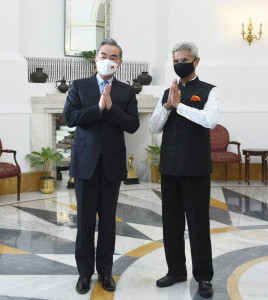 chinese fm seeks normal india ties delhi says ease border tension first chinese fm seeks normal india ties delhi says ease border tension first