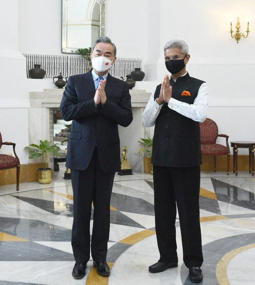 india s foreign minister subrahmanyam jaishankar and his chinese counterpart wang yi greet the media before their meeting in new delhi india march 25 2022 photo reuters