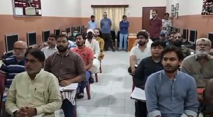 a group of inmates attend a chinese language class at the karachi central jail photo express