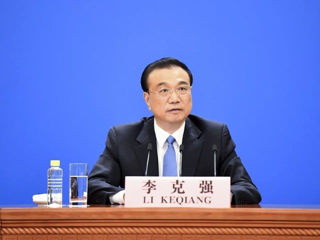 chinese premier li keqiang speaking at a news conference after the close of the annual meeting of parliament photo xinhua