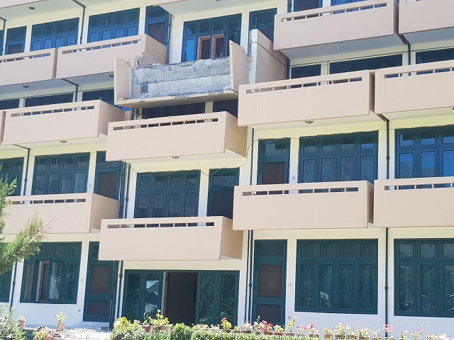 a view of the hotel s third floor balcony which gave away as members of three families stood enjoying sights of the city photo express