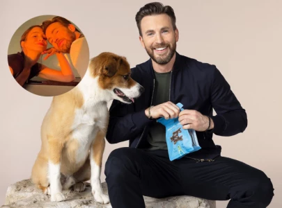 chris evans reveals why his beloved dog dodger missed his wedding with alba baptista