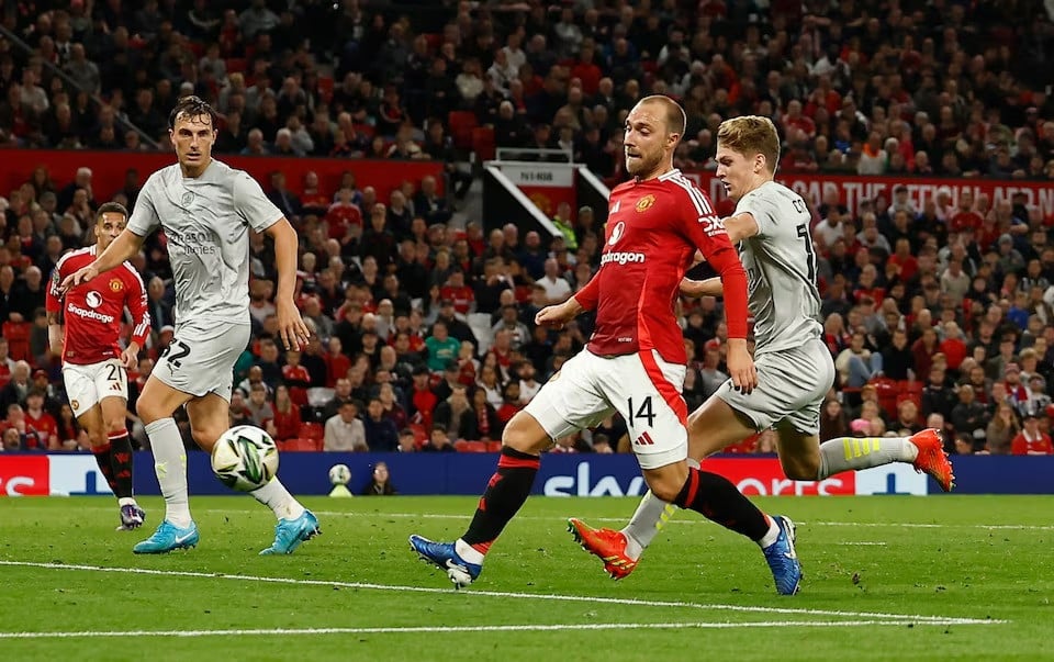 manchester united s christian eriksen scores their sixth goal against barnsley at old trafford manchester britain on september 17 2024 photo reuters