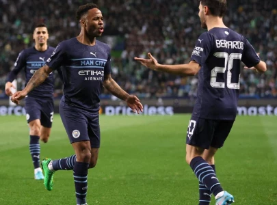 man city on brink of champions league quarters