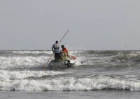 fisherman with a makeshift raft leave for a catch in the arabian sea near clifton beach in karachi pakistan june 7 2023 photo reuters