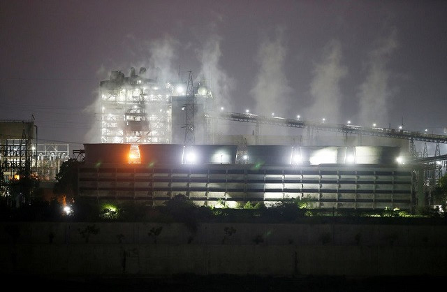 smoke billows from the cooling towers of a coal fired power plant in ahmedabad india october 13 2021 photo reuters