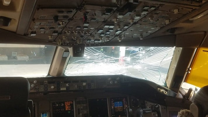 a view of the shattered windshield after a struck hit the pia aircraft on april 9 2022 photo express